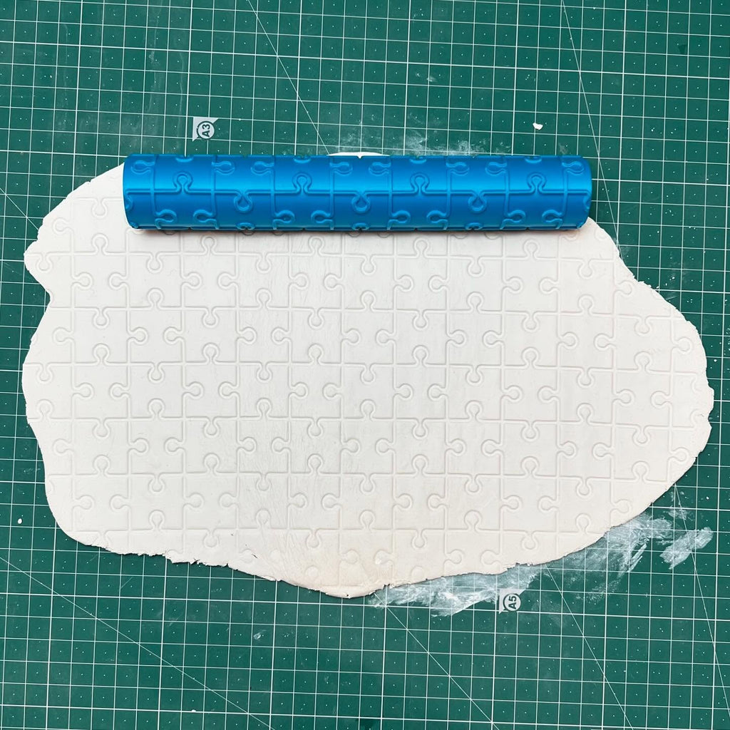 بكرة نقش أحجية الصور المقطوعة