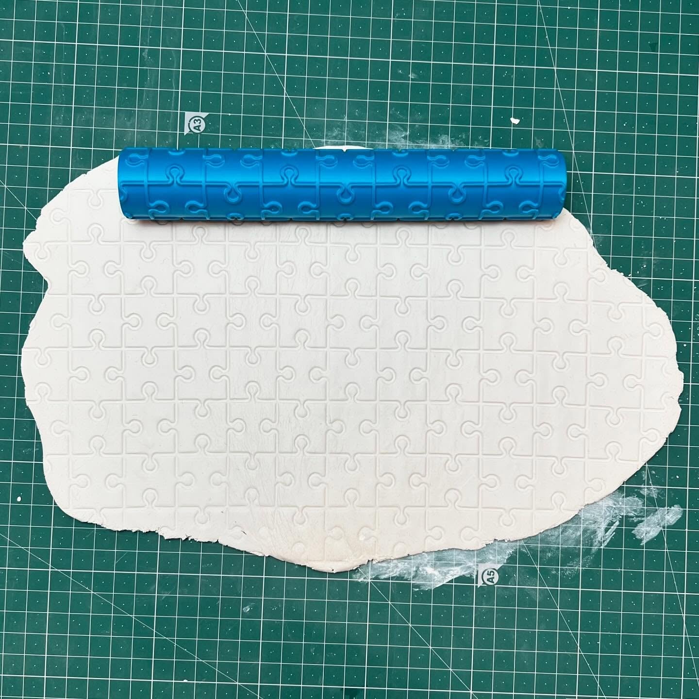 بكرة نقش أحجية الصور المقطوعة